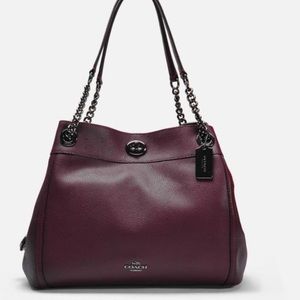 Coach Edie turn lock